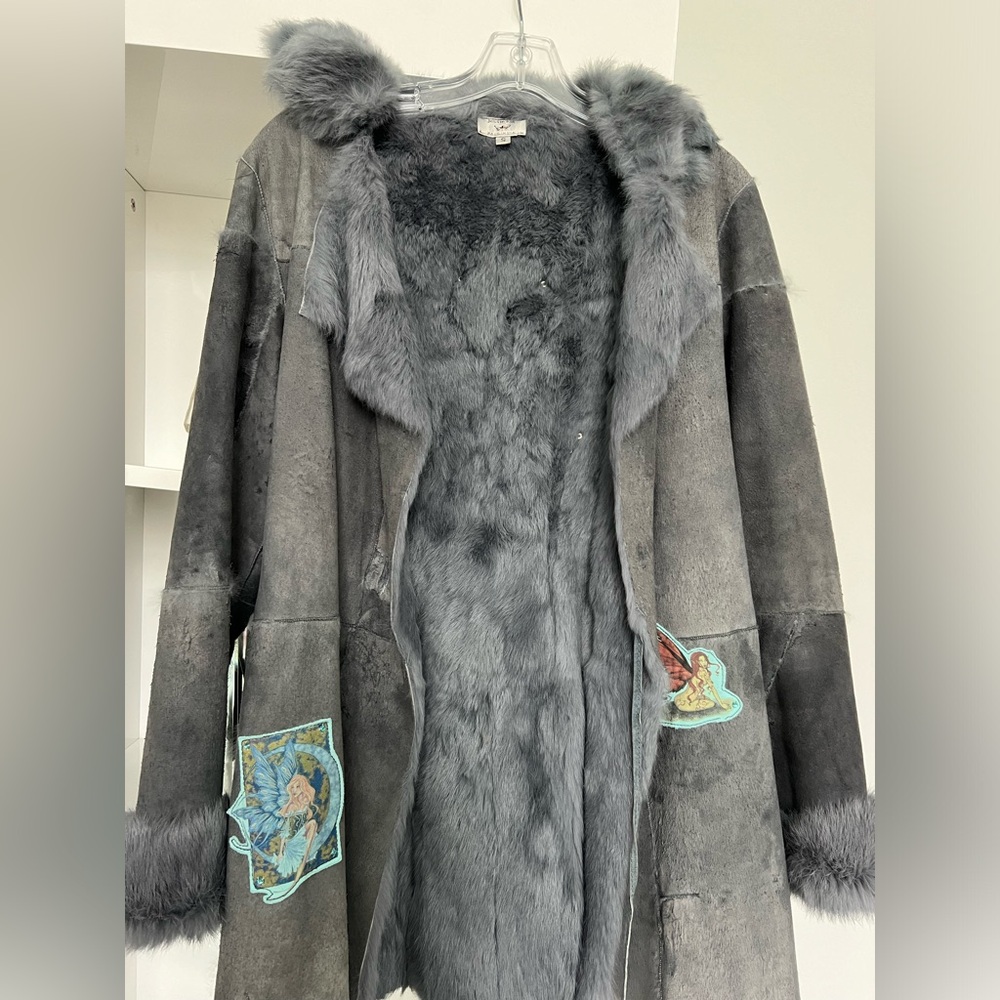 A fair jacket, real fair,  blue color , size small very warm